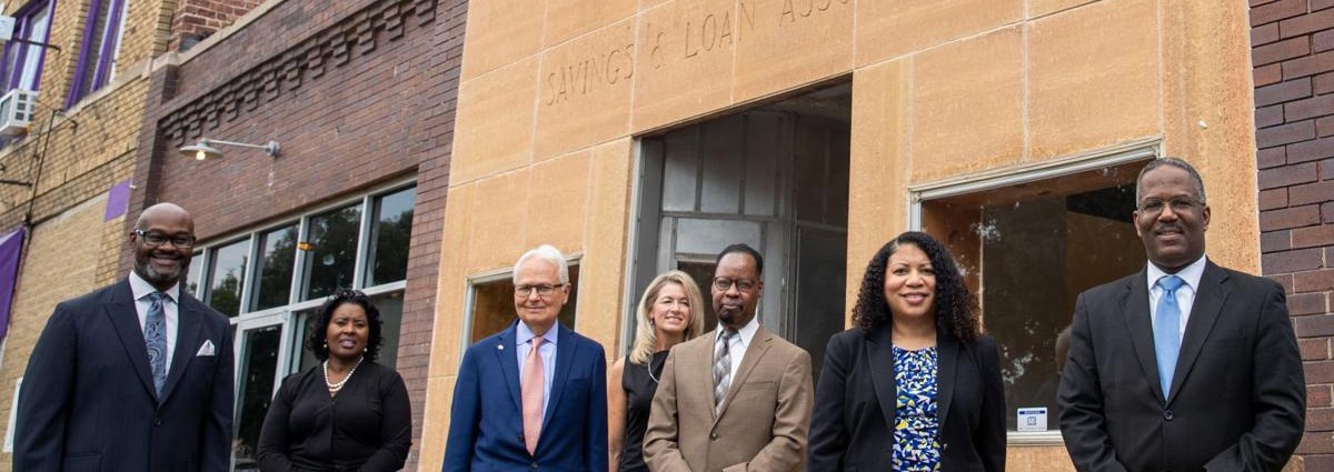 Photo of Carver Legacy Center Leadership in front of the Carver Building. 