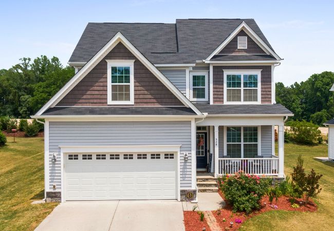 Exterior of a two-story home with landscaping